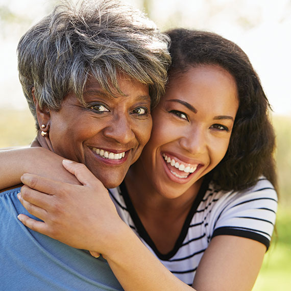 Two women smiling. Links to Gifts of Life Insurance life.jpg
