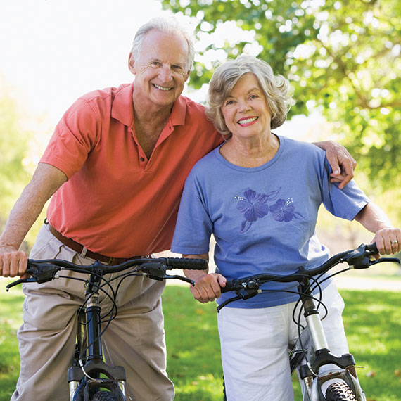A couple on bikes. Links to Tangible Personal Property property.jpg